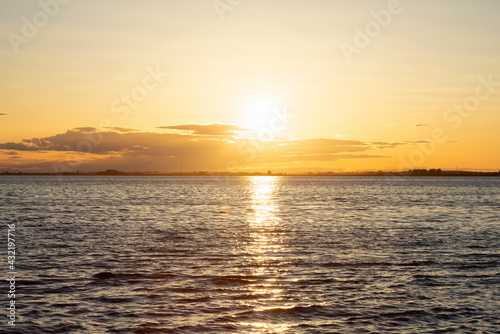 White Rock, Greater Vancouver, British Columbia, Canada. Colorful and Vibrant View of a cloudy and colorful sunset over the Pacific Ocean Coast. Nature Background