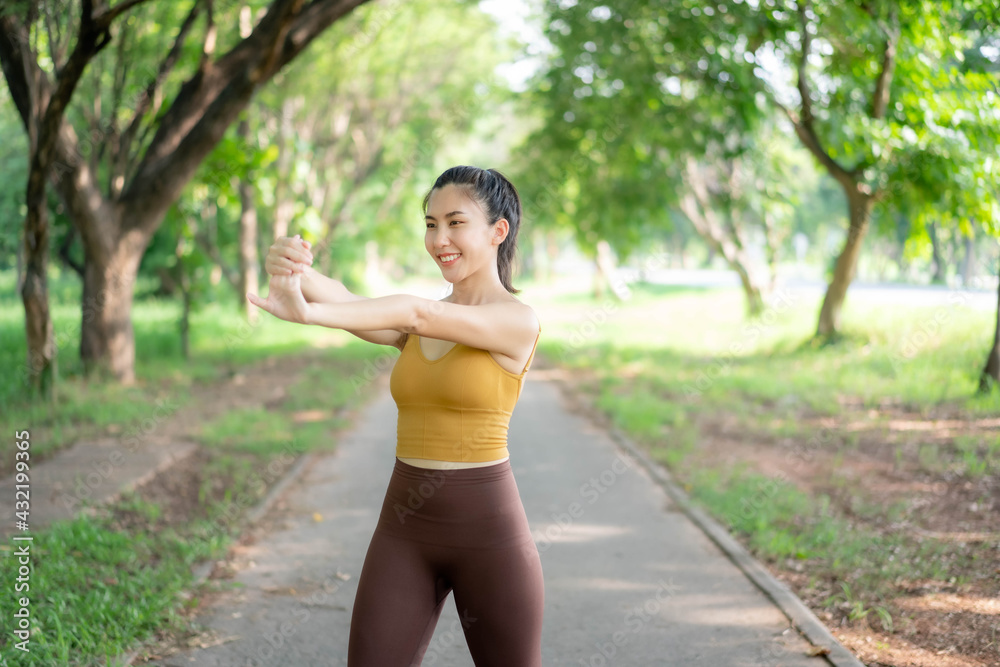 Asian women stretching and warm up before exercise Asian women stretching and warm up before exercise