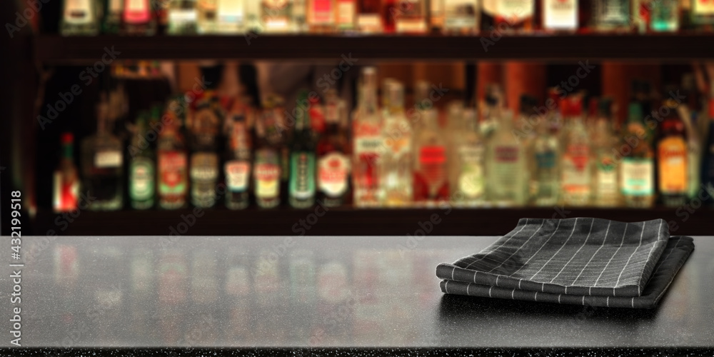 Blurred bar background and desk with napkin 
