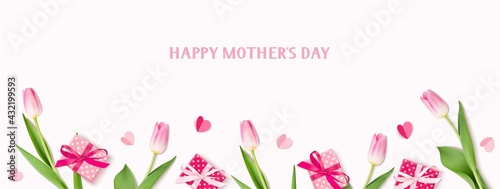 Happy Mothers Day. Holiday design template. Spring banner with decorative gift box, pink tulip flowers and paper hearts. Flat lay. Vector stock illustration