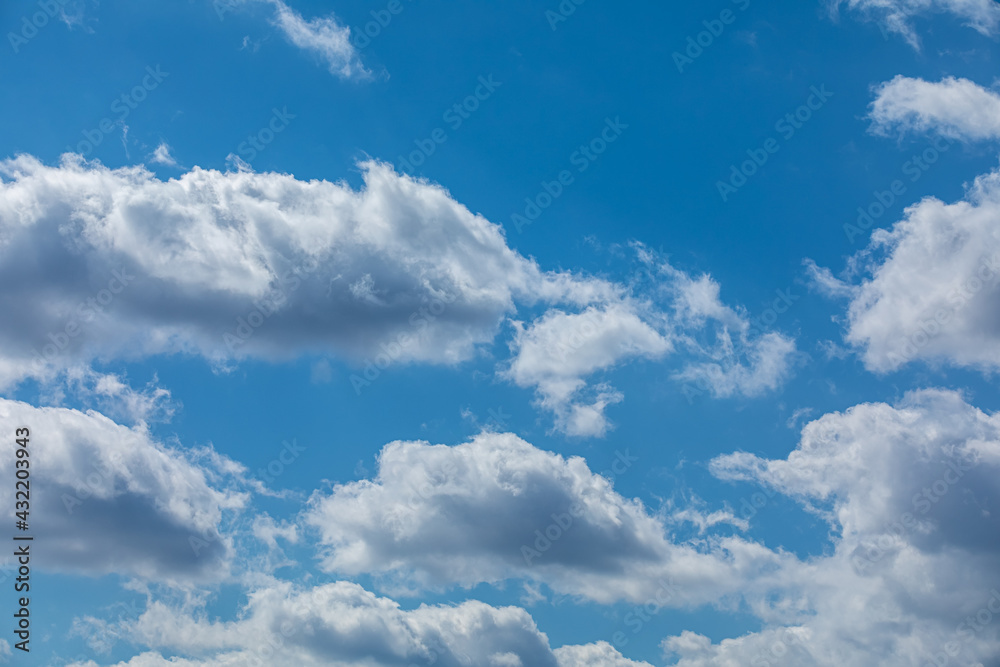 Blue skies with low clouds. Light clouds in summer weather. Blue skies with low clouds. Light clouds in summer weather.
