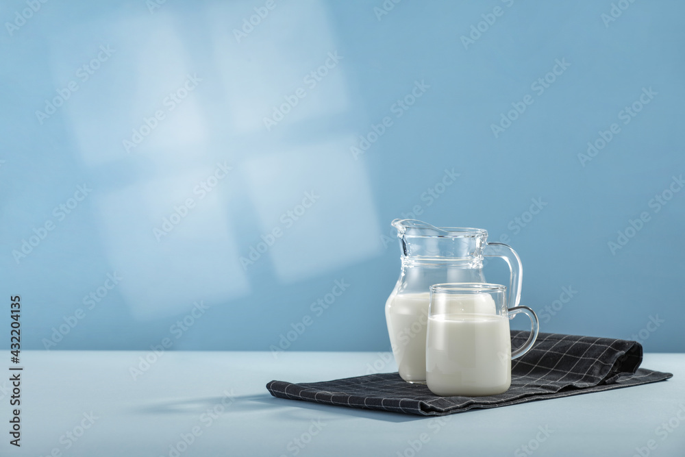 Fresh milk and blue background with shadow Fresh milk and blue background with shadow