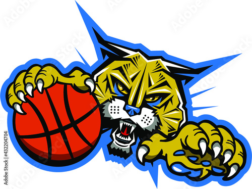 wildcat or bobcat basketball team mascot holding ball in claw for school, college or league