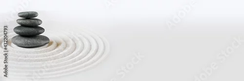 Obraz  z motywem Zen japanese garden and black stones background. Horizontal banner