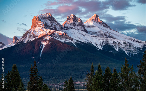 Three Sisters mountain peaks in the Canadian Rockies near Canmore, Alberta, Canada photo