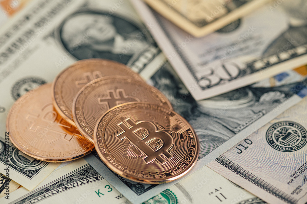 Money background. USA dollar with Euro Banknotes and Bitcoin cryptocurrency investing concept. Money background. USA dollar with Euro Banknotes and Bitcoin cryptocurrency investing concept.
