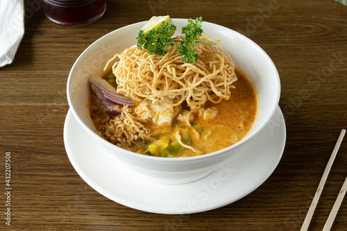 Spicy and hot tom yum soup served in a Thai restaurant. 