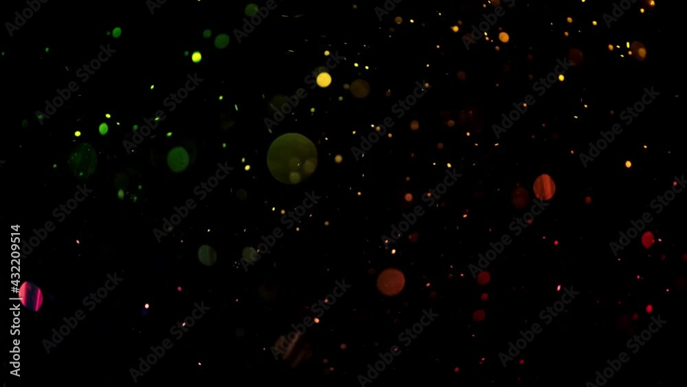 Glitter particles On Black Background Glitter particles On Black Background