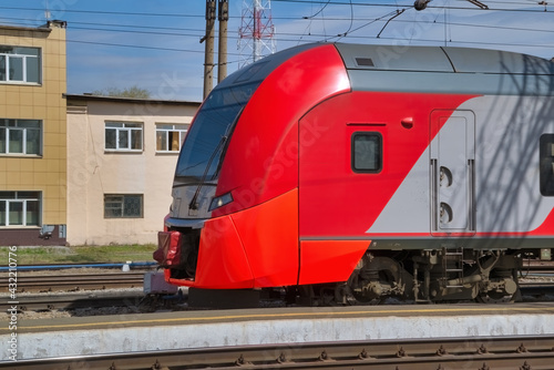 High-speed passenger electric train on the platform close-up.