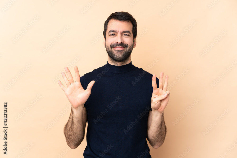 Caucasian handsome man over isolated background counting eight with fingers Caucasian handsome man over isolated background counting eight with fingers