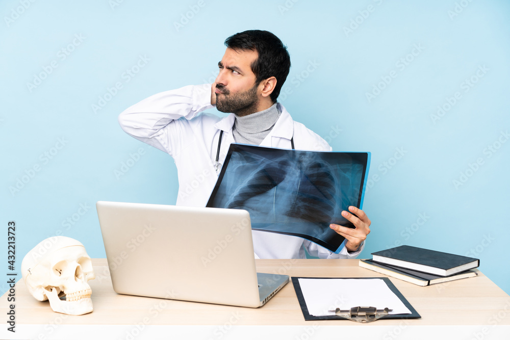 Professional traumatologist in workplace thinking an idea Professional traumatologist in workplace thinking an idea