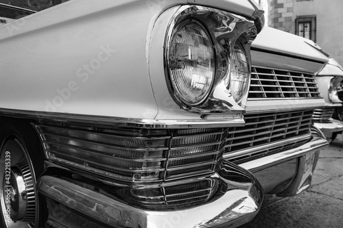 Vlack and white classic car on the street photo