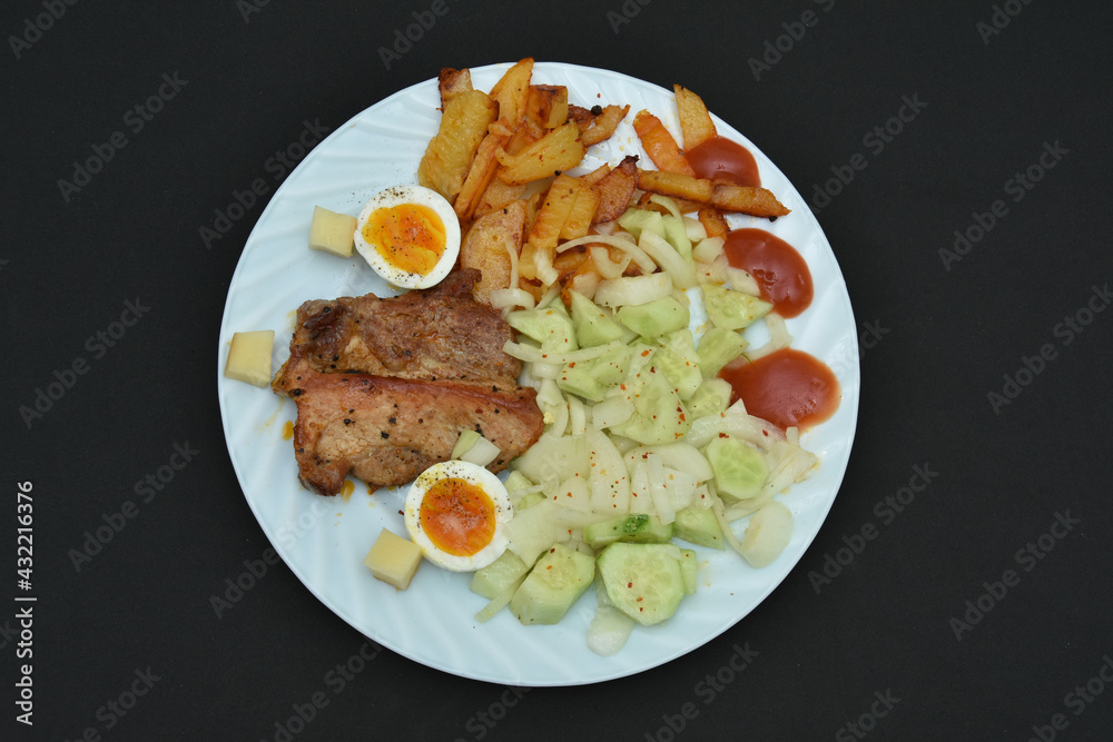 Traditional romanian food ,potato salad with barbecue Traditional romanian food ,potato salad with barbecue