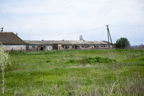 Old brick houses of a worker of a livestock complex built in the USSR Ukraine