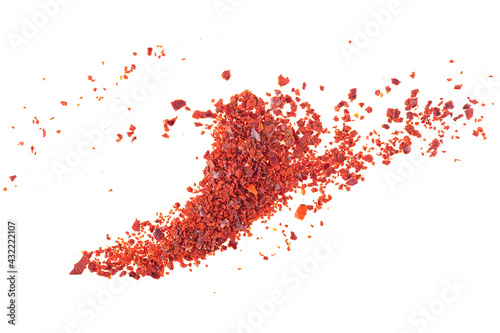 Top view of crushed red chili pepper flakes isolated on white background