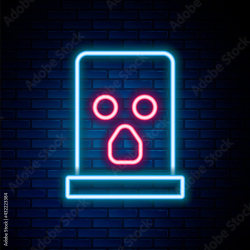 Glowing neon line Balaclava icon isolated on brick wall background. A piece of clothing for winter sports or a mask for a criminal or a thief. Colorful outline concept. Vector