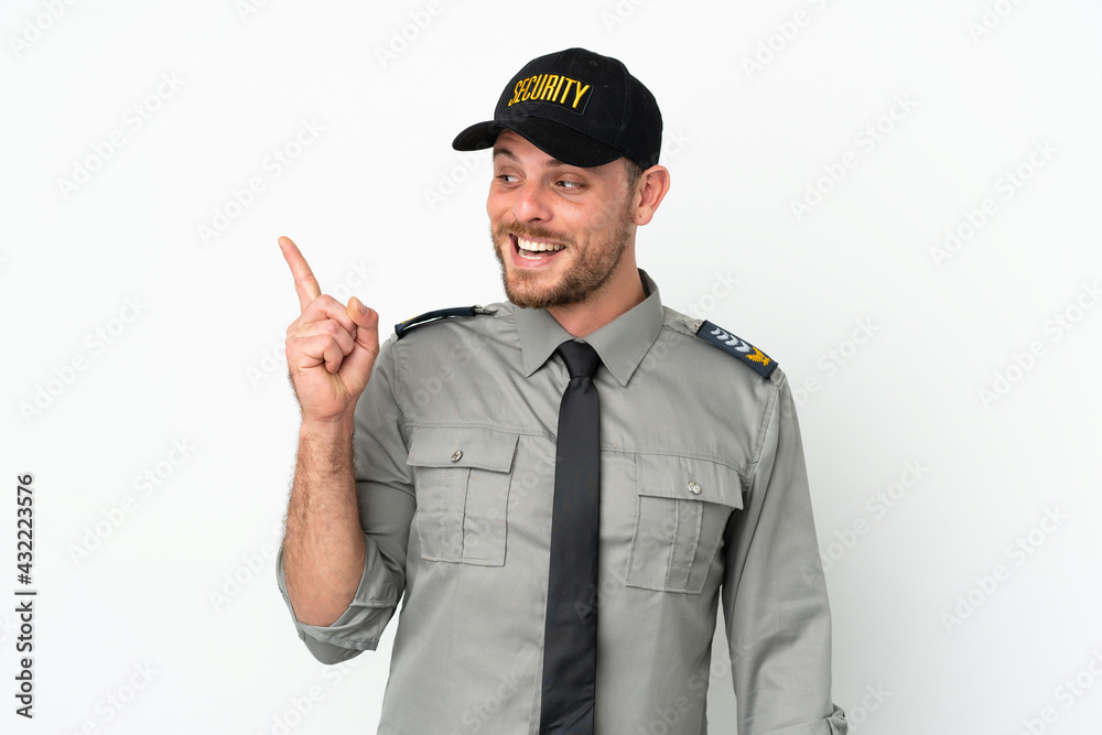 Young security Brazilian man isolated on white background intending to realizes the solution while lifting a finger up Young security Brazilian man isolated on white background intending to realizes the solution while lifting a finger up