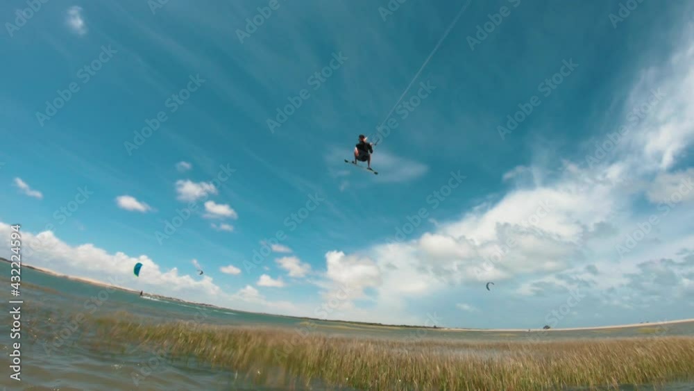 kitesurfer jumping in the sky kitesurfer jumping in the sky
