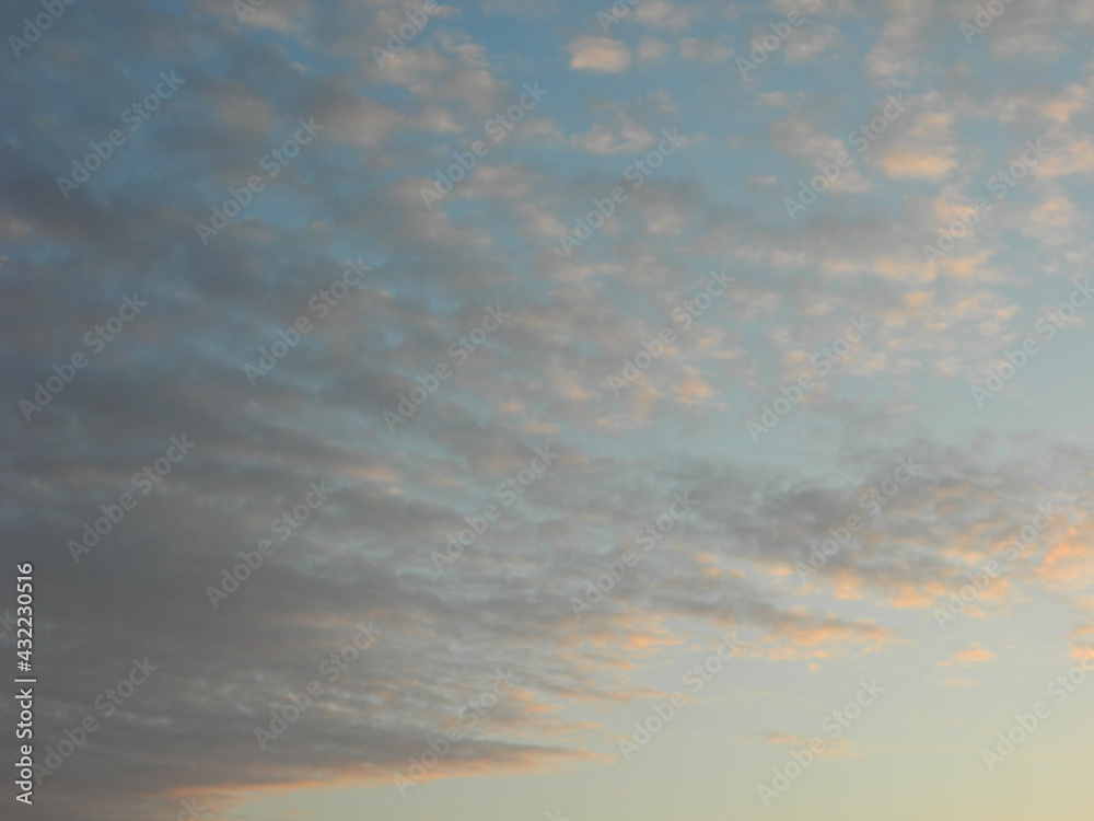 Fototapeta premium purple clouds in the blue sky