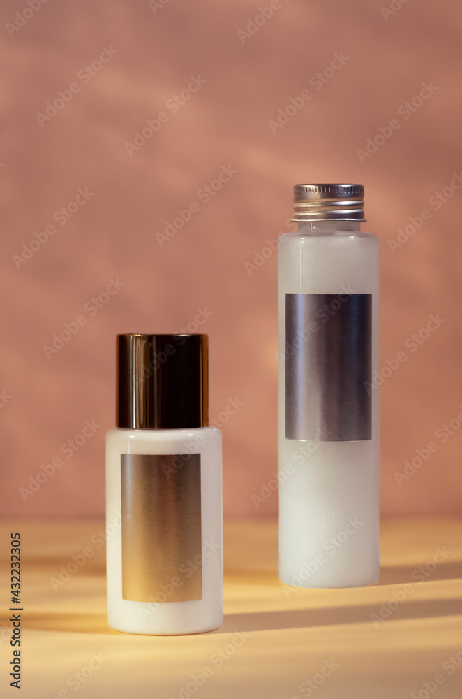 cosmetics set, skin care, cream tube with gold cap, body lotion with silver cap, shower gel cosmetics set, skin care, cream tube with gold cap, body lotion with silver cap, shower gel