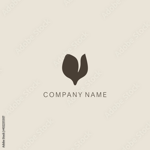 Simple, elegant, minimalistic, stylized tulip symbol or logo, consisting of one element. Made with a smoothed spot.