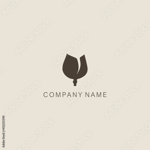 Simple, elegant, minimalistic, stylized tulip symbol or logo, consisting of one element. Made with a spot.