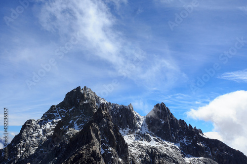 Bild auf Leinwand clouds over the mountain Pico Bolivar in Merida - Mountains landscape with sno