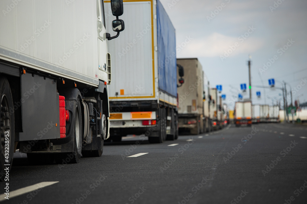 a long traffic jam of many trucks at the border , a long wait for customs checks between States due to the coronavirus epidemic, increased sanitary inspection of cargo transport