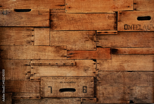 Wood background made of old wine crates in a wine cellar with aged texture photo