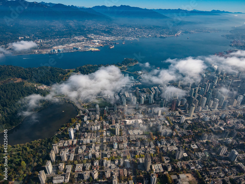 Stock aerial photo of scattered clouds over downtown Vancouver  Canada