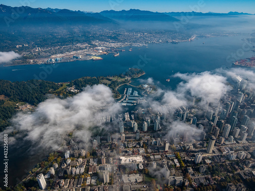 Stock aerial photo of scattered clouds over downtown Vancouver, Canada