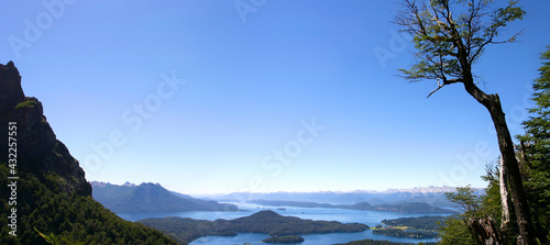 Landscape of Nahuel Huapi Lake in San Carlos de Bariloche during the day against a blue clear sky, Argentina