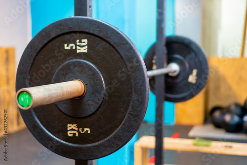 weight bar in a crossfit gym, not people.