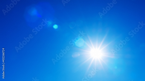 Natural background of sky and bright sun with soft effect.   sky background in soft colors with rays and highlights