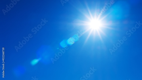 Natural background of sky and bright sun with soft effect. sky background in soft colors with rays and highlights