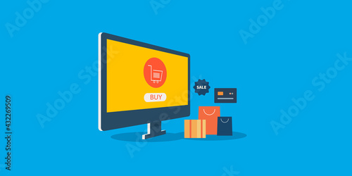 Online shopping and ecommerce webstore on computer, shopping cart with shopping bag and package.  Online payment and credit card purchase. 