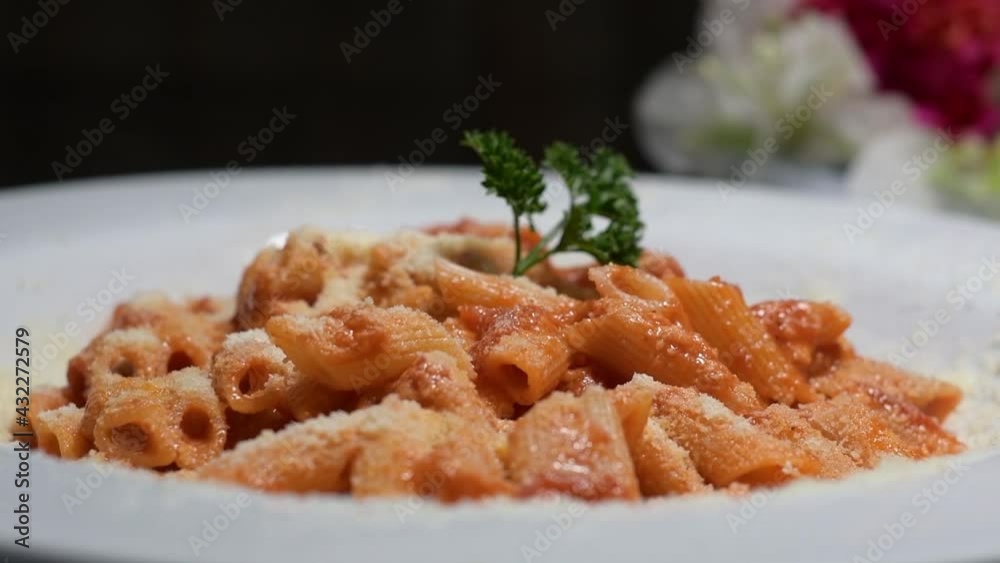 closeup red pasta with tomato and parsley closeup red pasta with tomato and parsley