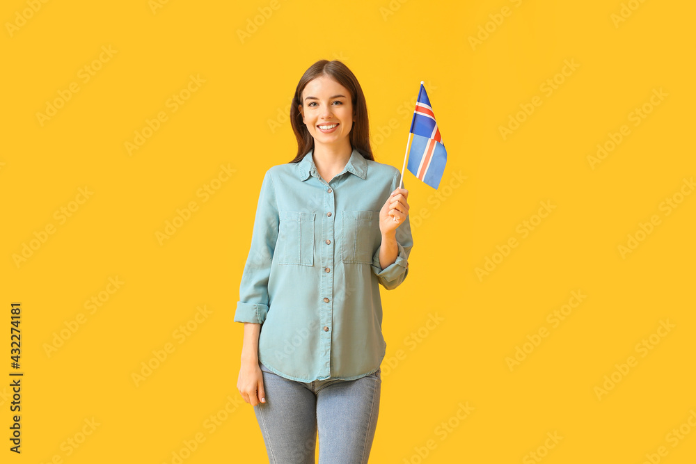 Beautiful young woman with the flag of Iceland on color background Beautiful young woman with the flag of Iceland on color background