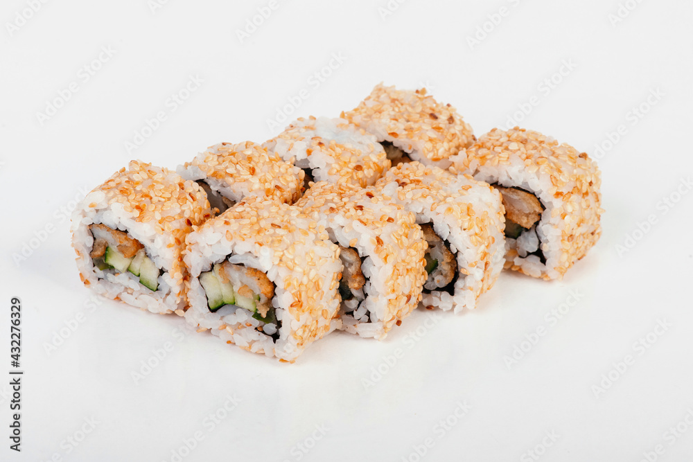 Sushi rolls isolated on white background. Sushi roll with cucumber, shrimp and sesame seeds