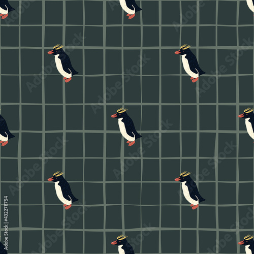 Scrapbook seamless doodle pattern with crested penguins ornament. Blue chequered background. Arctic artwork.