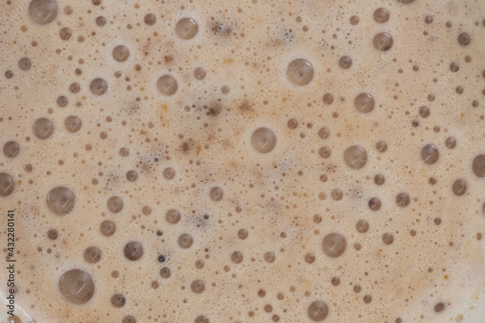 Close up view of the texture of a delicious cappuccino coffee. Close up view of the texture of a delicious cappuccino coffee.
