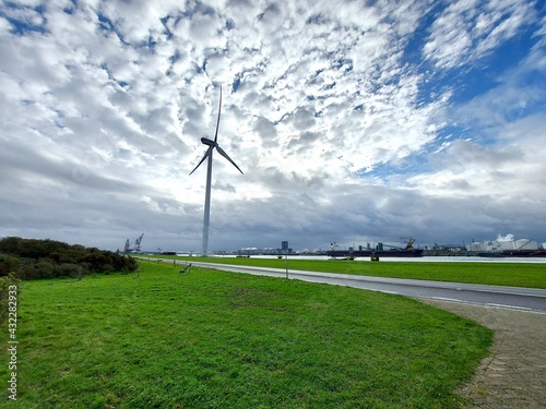 Noordzeeweg on the Rozenburg headland with ships and windmills photo
