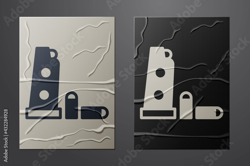 White Gun magazine and bullets icon isolated on crumpled paper background. Paper art style. Vector