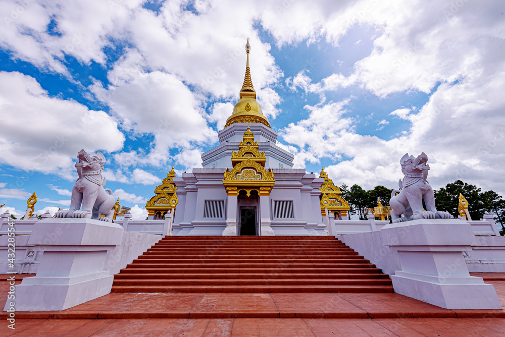 Fototapeta premium Phra Maha Chedi Thepnimittham At Phra That Santitham Temple in Village Mae Salong Nok, Chiang Rai province, Thailand.