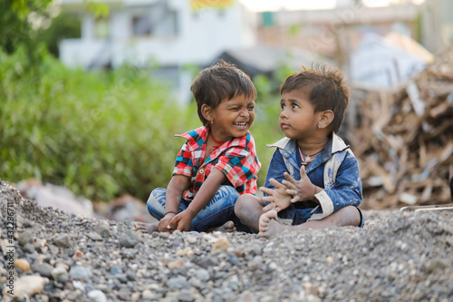 Tablou pe pânză indian poor child playing at home