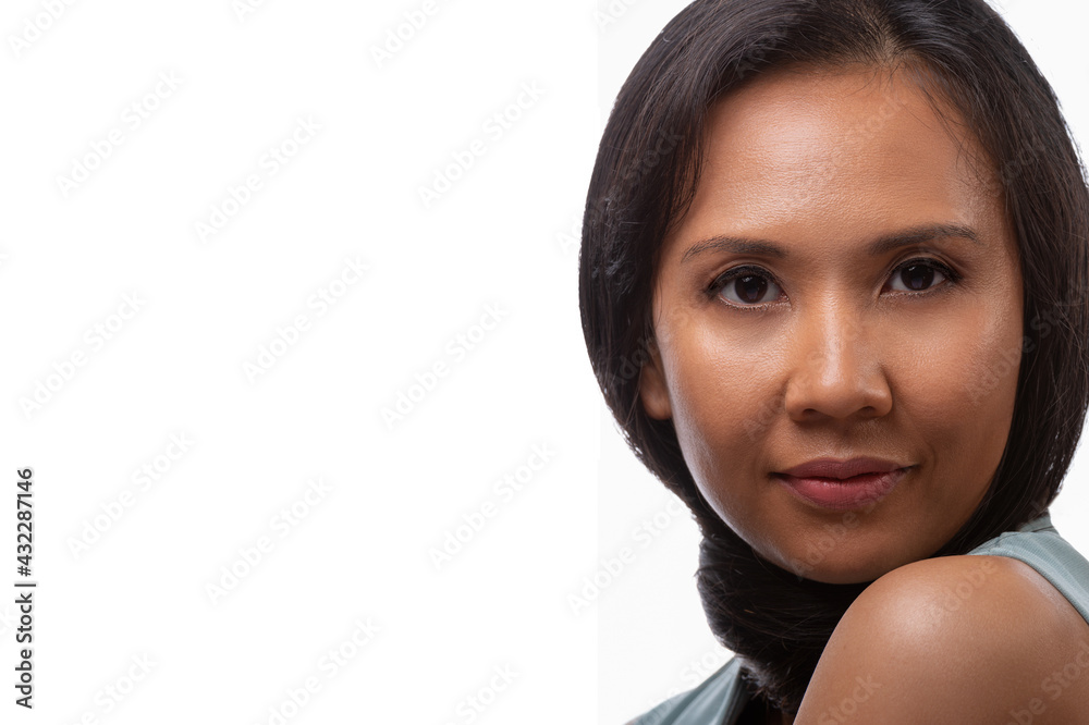 Studio close up portrait of beautiful woman face with copyspace isolated on white background Studio close up portrait of beautiful woman face with copyspace isolated on white background
