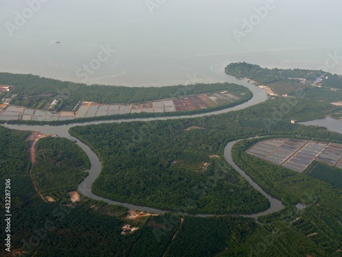 Photography Aerial view Malaysia landscape approaching Kuala Lumpur airport.