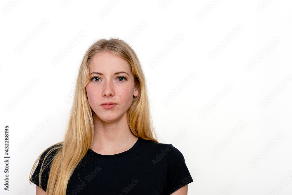 portrait of a young blonde female isolated on a white background portrait of a young blonde female isolated on a white background