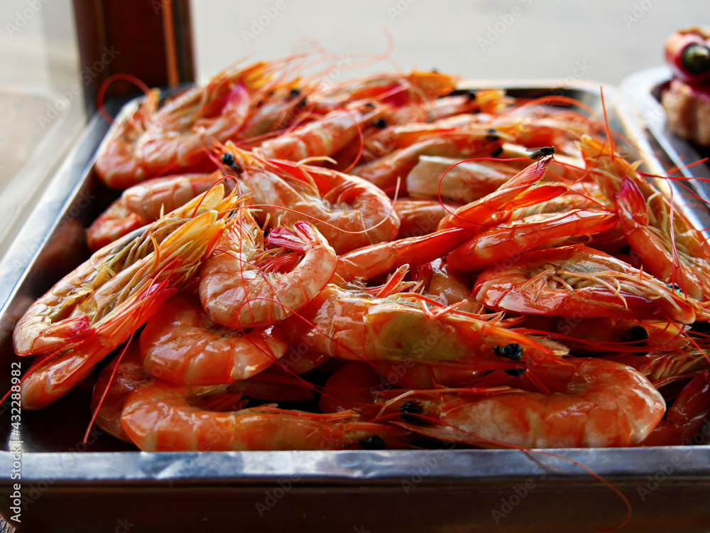 Tray of cooked shrimps at a seafood restaurant