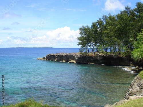 Beautiful coast and crystal clear waters of Angaur, Palau.